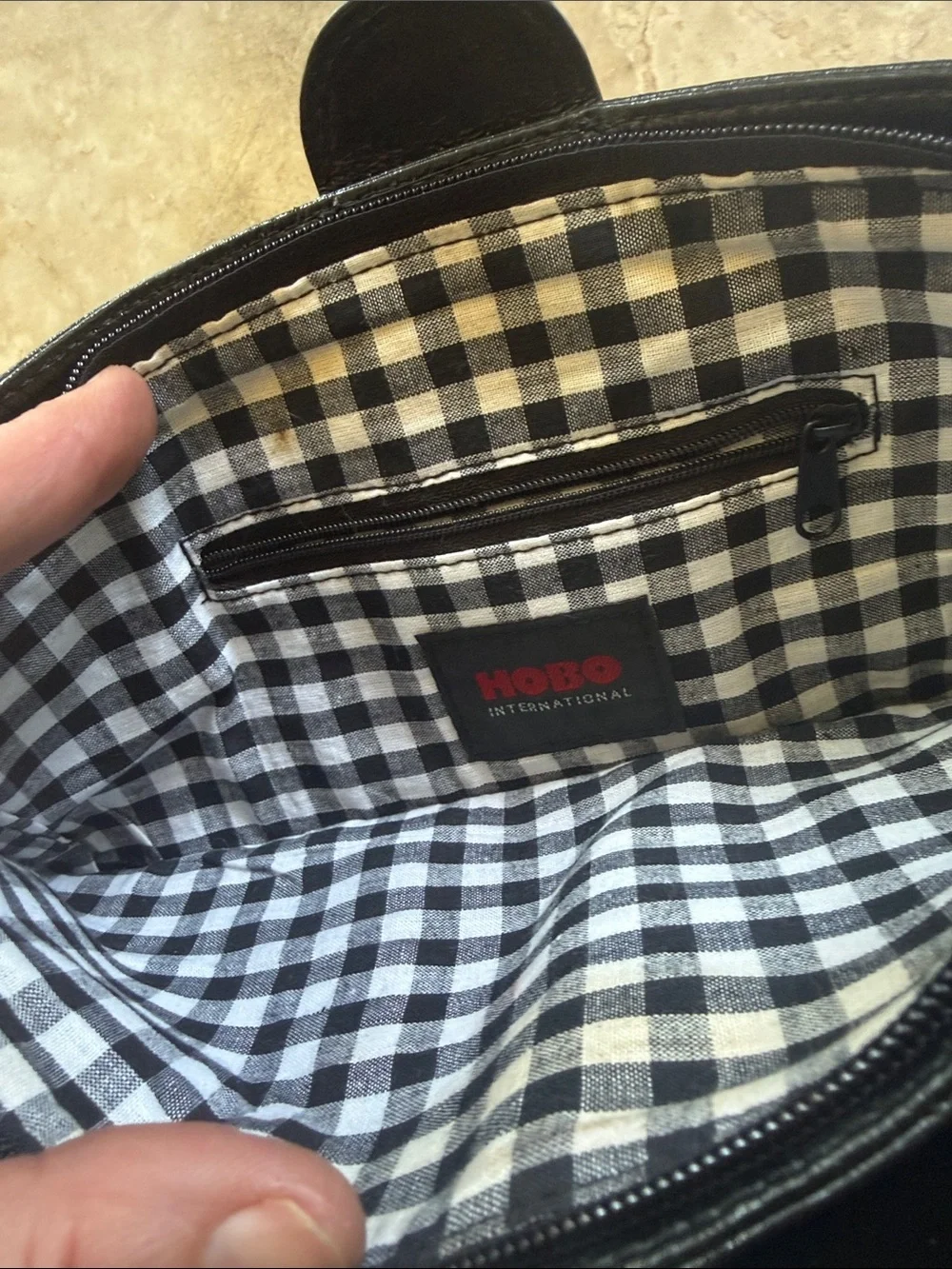 HOBO black leather fold over clutch preowned good condition